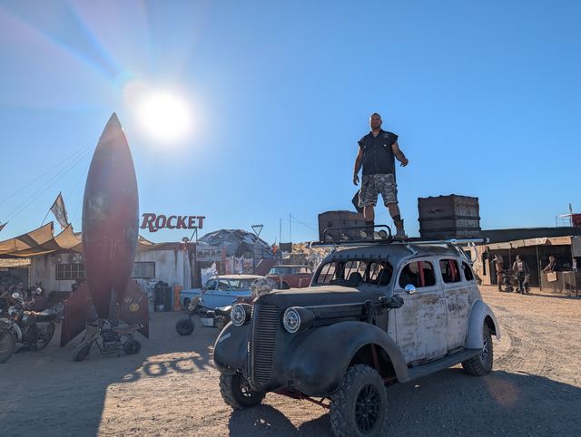 The same rooftop pose by the Red Rocket from a lower angle.